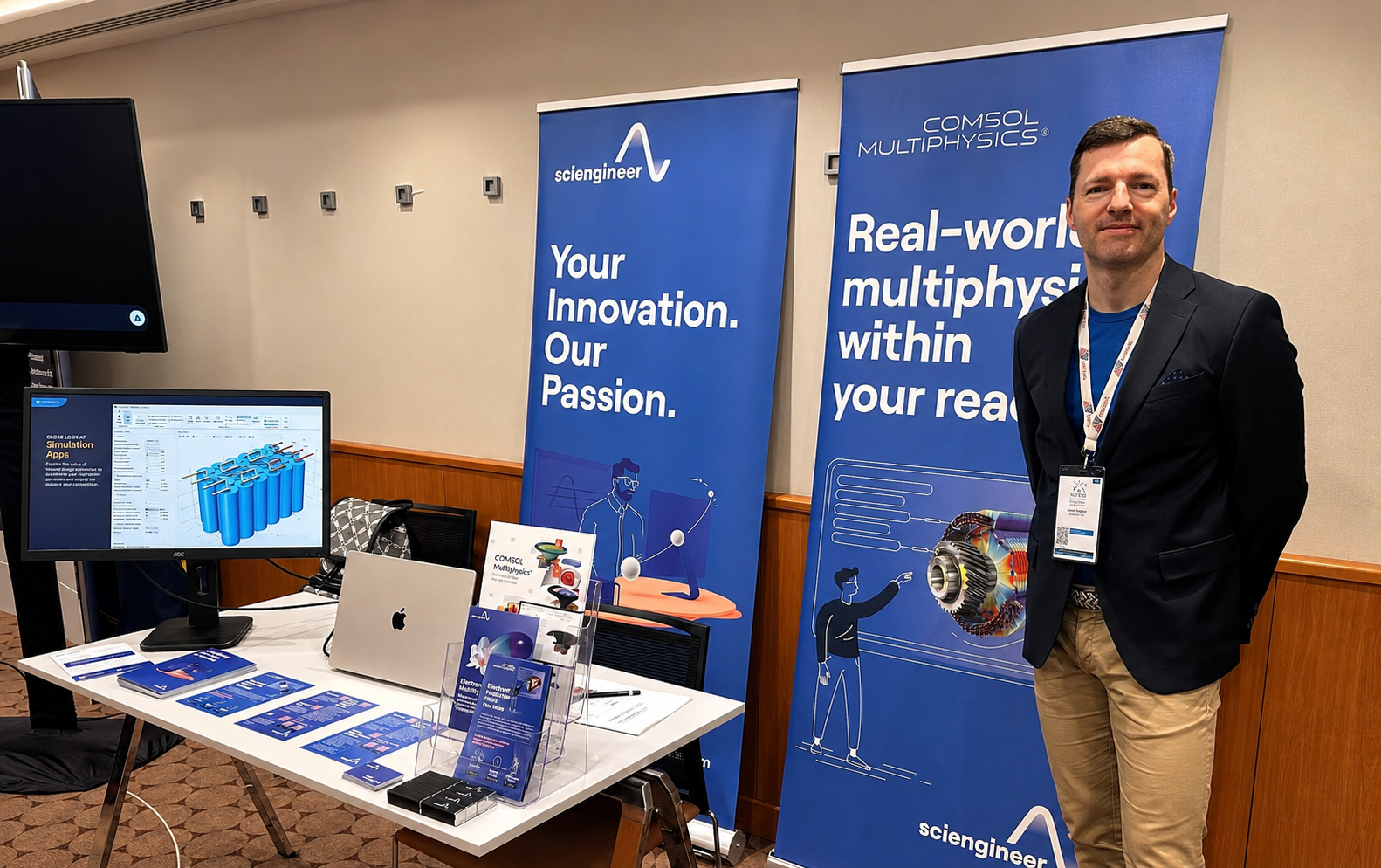 Arpad standing in front of SciiEngineer's multiphysics booth